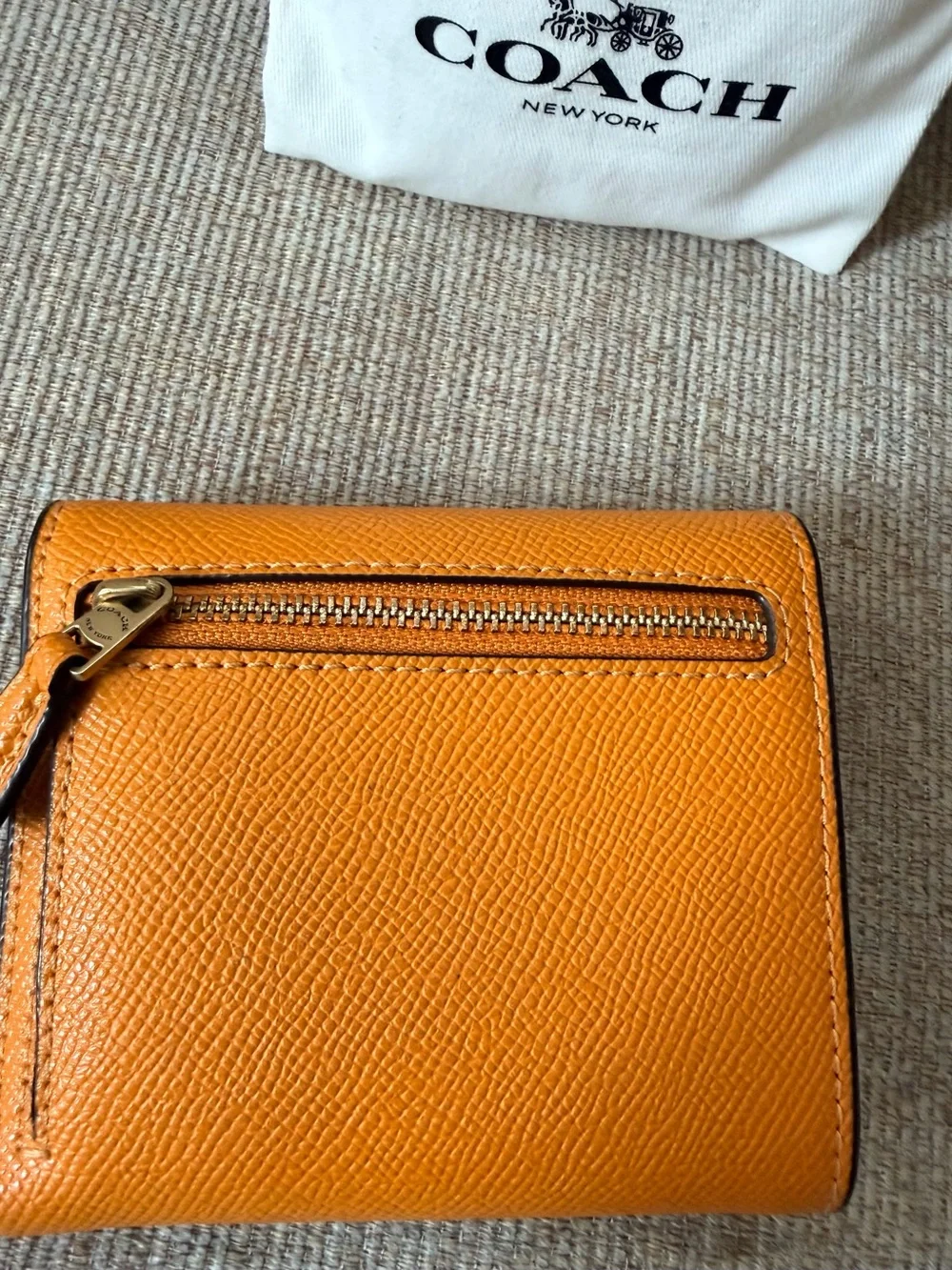 Coach Orange Leather Compact Wallet with Gold 'C' Hardware